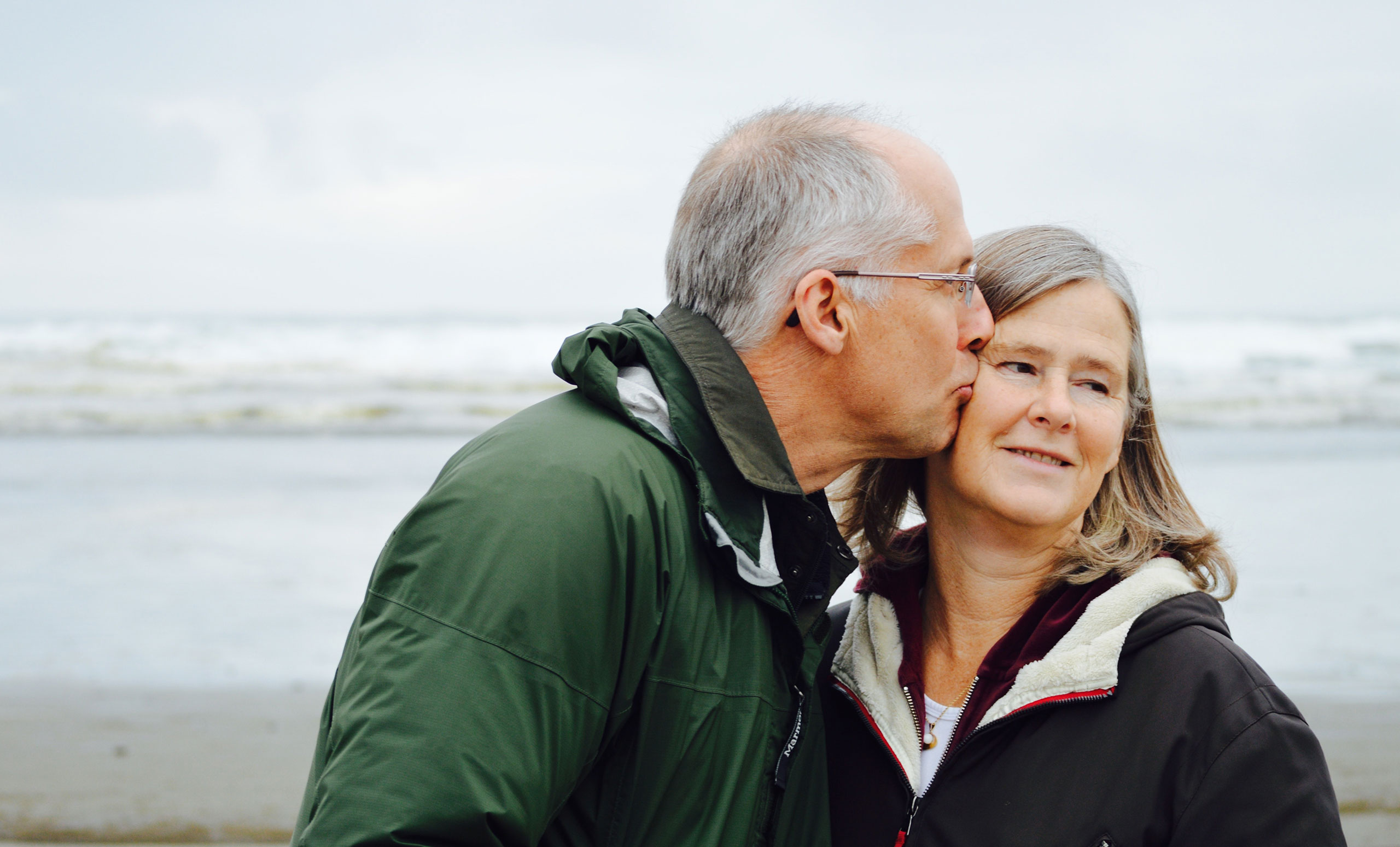 Couple kissing on beach